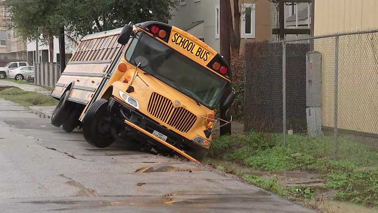 Bus tipped over into ditch in The Heights